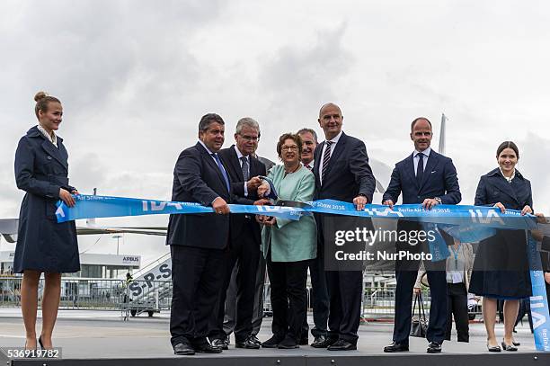 Sigmar Gabriel, Bernhard Gerwret, Brigitte Zypries and Dietmar Woidke ribbon cutting the opening ceremony at the International Aerospace Exhibition...