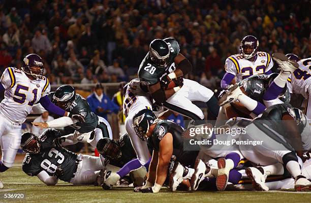 Correll Buckhalter of the Philadelphia Eagles goes over the Minnesota Vikings defense for a second quarter touchdown in their game at Veterans...