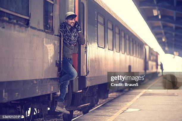 Getting Off 11,306 People Getting Off Train Stock Photos, High-Res Pictures, and ...