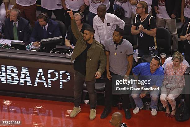 Rapper, Drake attends game four of the Eastern Conference Finals between the Cleveland Cavaliers and the Toronto Raptors on May 23, 2016 during the...