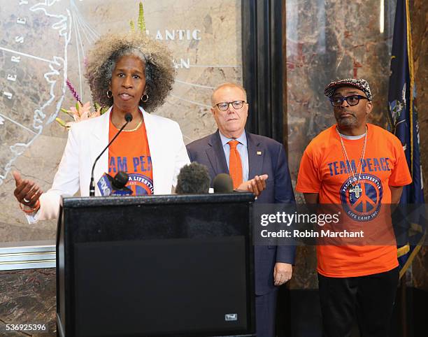 Erica Ford, John Feinblatt, President of Everytown for Gun Safety and Spike Lee lights The Empire State Building In Recognition Of National Gun...