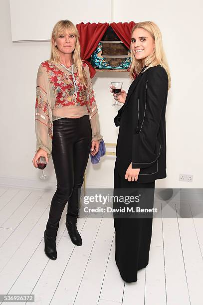Deborah Leng and Tiger Lily Taylor attend the LiudMila Pre Spring 17 Presentation hosted by Leandra Medine on June 1, 2016 in London, England.
