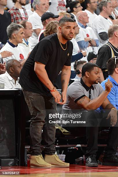 Rapper, Drake attends game four of the Eastern Conference Finals between the Cleveland Cavaliers and the Toronto Raptors on May 23, 2016 during the...