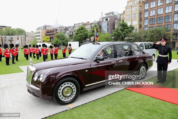 Britain's Queen Elizabeth II leaves after a visit to the Honourable Artillery Company in London on June 1, 2016. The engagement marks the Queen...