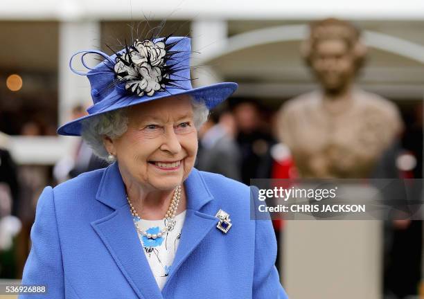 Britain's Queen Elizabeth II visits the Honourable Artillery Company in London on June 1, 2016. The engagement marks the Queen becoming the longest...