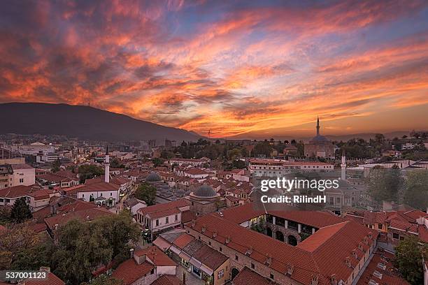 macedonia, skopje, old bazaar, cityscape with moody sunset sky - skopje stock-fotos und bilder