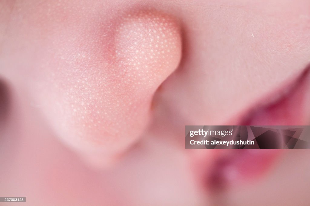 Close-up of sleeping baby girl's (0-1 months) face