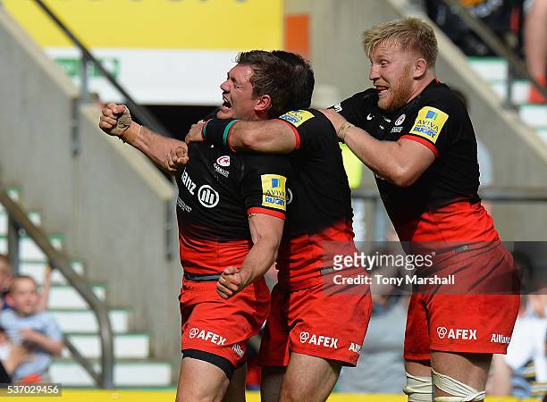 Alex Goode of Saracens celebrates scoring a try during the Aviva Premiership final match between Saracens and Exeter Chiefs at Twickenham Stadium on...