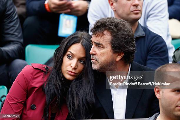 Arnaud Lagardere and his wife Jade are watching the match between Richard Gasquet and Andy Murray during the French Tennis Open at Roland Garros on...