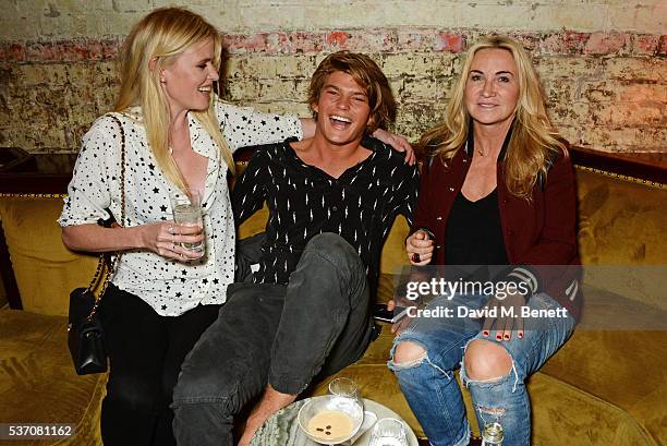 Lara Stone, Jordan Barrett and Meg Mathews attend the launch of the Kate Moss For Equipment x NET-A-PORTER collection at The Chiltern Firehouse on...