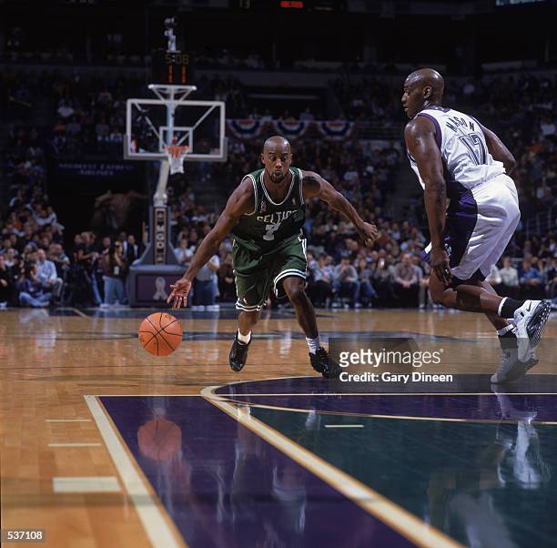 Point guard Kenny Anderson of the Boston Celtics drives into the lane during the NBA game against the Milwaukee Bucks at the Bradley Center in...
