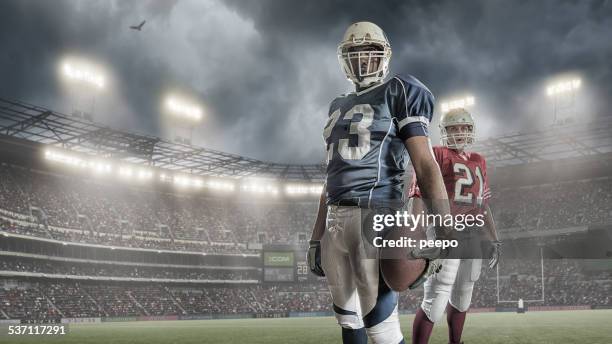 american football players - american football strip stock pictures, royalty-free photos & images