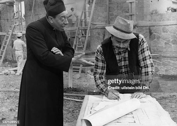 Fernandel - Actor, singer, France - Scene from the movie 'Le petit monde de Don Camillo'' - with Gino Cervi Directed by: Julien Duvivier France /...