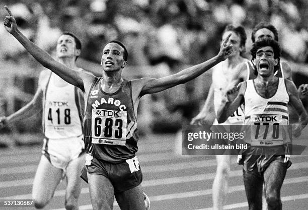 Leichtathlet; Marokko, Leichtathletik-WM in Rom, 5000 m - Finale, Sieger Said Aouita, Domingos Castro, und Jack Bruckner, - September 1987