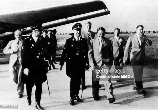Heinrich Himmler Politician, Nazi Party, Germany Himmler receiving members of an SS-Tibet-Expedition on their return at Munich Riem Airport; right,...