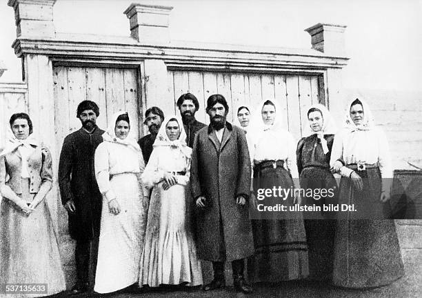 Russian mystic Grigori Rasputin with a group of his disciples, Russia, circa 1905.