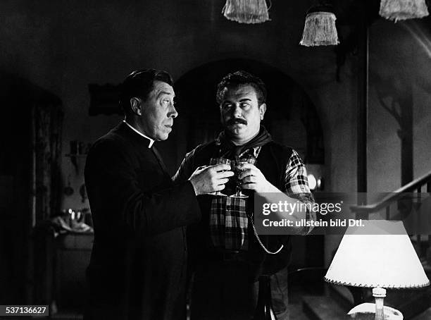 Fernandel - Actor, singer, France - Scene from the movie 'Le petit monde de Don Camillo'' - with Gino Cervi Directed by: Julien Duvivier France /...