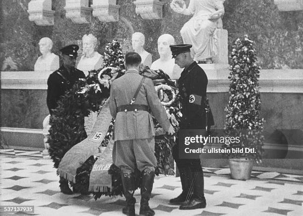 German Chancellor Adolf Hitler placing a wreath at the bust of Austrian composer Anton Bruckner at the Walhalla temple in Bavaria, Germany, 6 June...