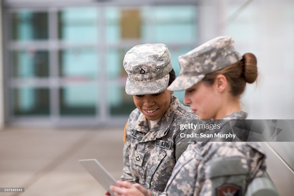 Two Military Girls Looking at Tablet
