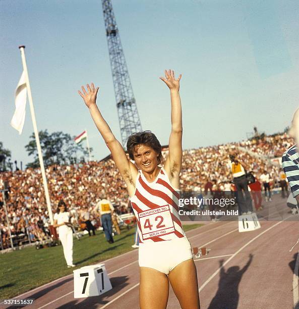 Sprinterin DDR, Olympischer Tag in Berlin: jubelt über, ihren Weltrekord über 100m in 10,81 sek, - 1983