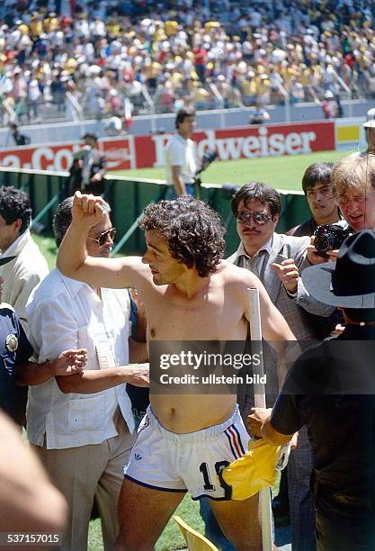 World Cup in Mexico Michel Platini *1955 Football player, France, member of the national team - Michel Platini stripped to the waist celebrating...