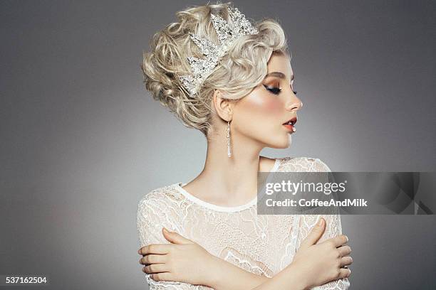 studio shot of young beautiful woman - woman crown stock pictures, royalty-free photos & images