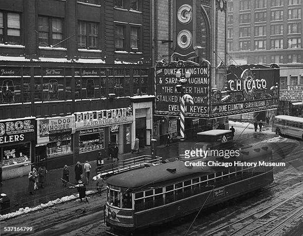 View of the Chicago Theatre from State and Lake L station looking southeast along State Street in Chicago, Illinois, January 1951.