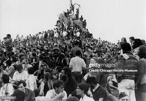 Students crowded around General Logan Monument during the 1968 National Democratic National Convention in Chicago, Illinois, August 1968.