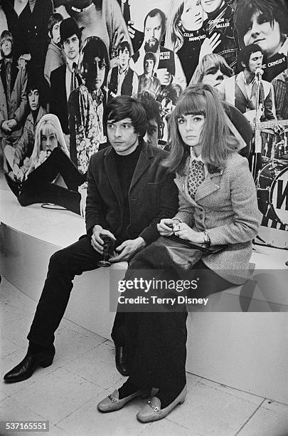 English photographer David Bailey with English model and actress Chrissie Shrimpton at Madame Tussauds, London, 21st March 1967.