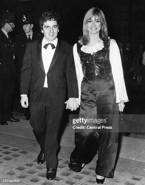 Comedic actor Dudley Moore and actress Suzy Kendall, arriving hand in hand at the premiere of 'The Penthouse', Curzon Cinema, London, September 29th...