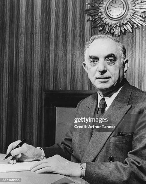 Portrait of Nuri Al Said, Prime Minister of Iraq, working at his desk, printed at the time of his reported death, July 14th 1958.