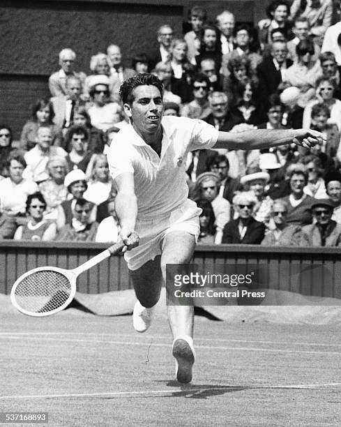 Spanish tennis player Manuel Santana in play, at Wimbledon Tennis Tournament, London, 1968.