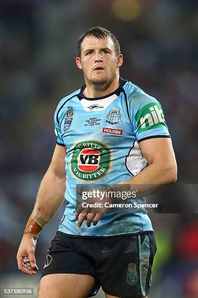 Josh Morris of the Blues looks on during game one of the State Of Origin series between the New South Wales Blues and the Queensland Maroons at ANZ...