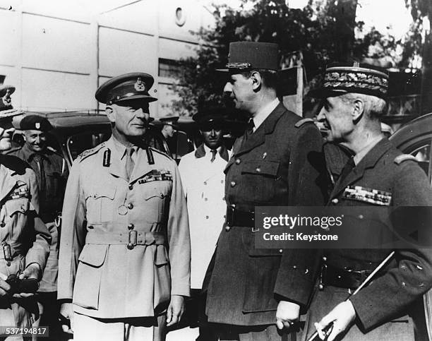 Air Chief Marshal Arthur Longmore talking to General Charles de Gaulle and General Georges Catroux in Cairo, Egypt, circa 1965.