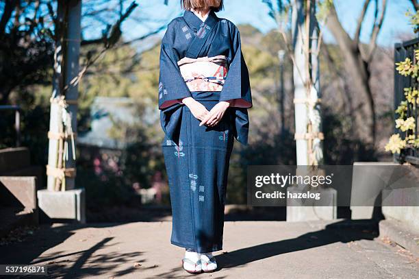 front view of woman in kimono - kimono winter stock pictures, royalty-free photos & images