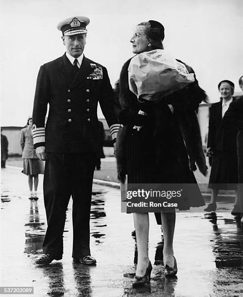 Lord and Lady Mountbatten, followed by Pamela Mountbatten, arriving at London Airport, May 10th 1952.