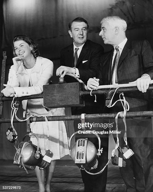 Actors Ingrid Bergman, Michael Redgrave and Emlyn Williams , discussing their play 'A Month in the Country', opening soon at the Cambridge Theatre,...