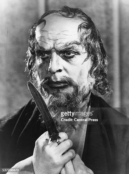 Portrait of actor Emlyn Williams in costume as 'Shylock', as he appears in the play 'The Merchant of Venice', at the Shakespeare Memorial Theatre,...