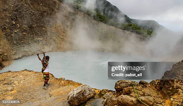 touristic guide at the boiling lake - dominica stock pictures, royalty-free photos & images