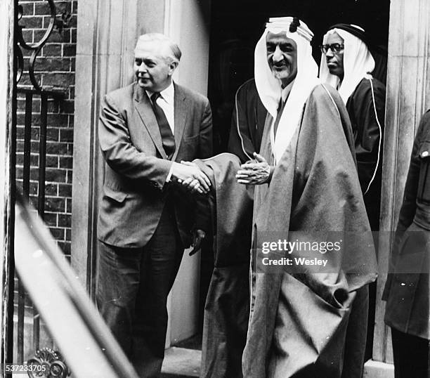 British Prime Minister Harold Wilson shaking hands with King Faisal of Saudi Arabia, outside 10 Downing Street, London, May 23rd 1967.