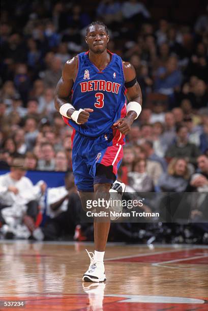Forward Ben Wallace of the Detroit Pistons runs up the court during the NBA game against the Chicago Bulls at the United Center in Chicago, Illinois....