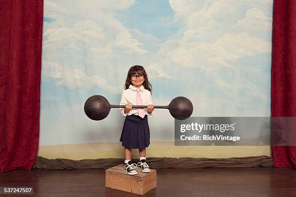 young business girl on stage holding barbell - young kid and barbell bildbanksfoton och bilder