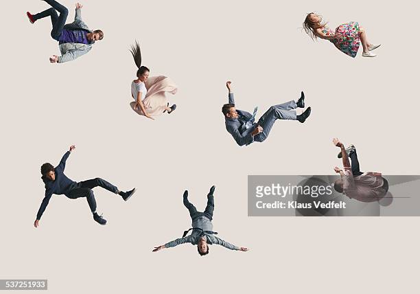 group of people in the air, falling down - jumping photos et images de collection