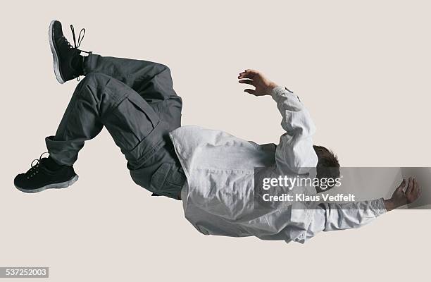 man falling in the air - people in air stock pictures, royalty-free photos & images