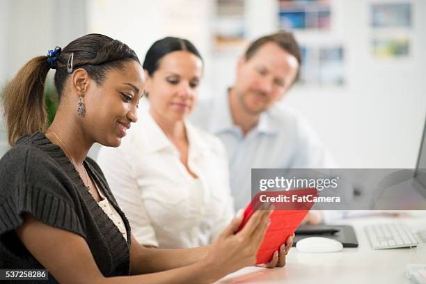 working on the companies social media - rewards program stock pictures, royalty-free photos & images