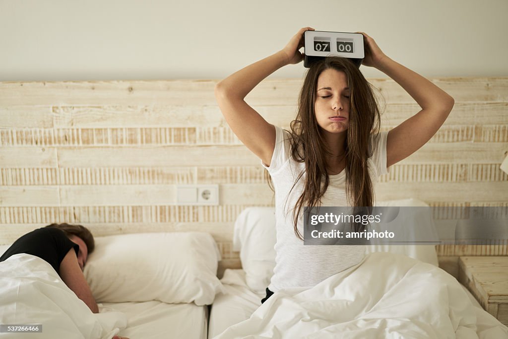 Woman in bed with burnout