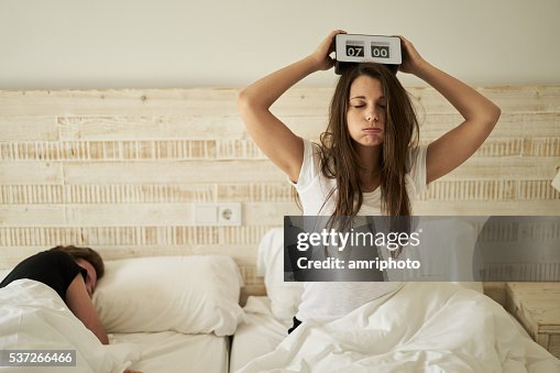 Woman in bed with burnout Woman in bed with burnout