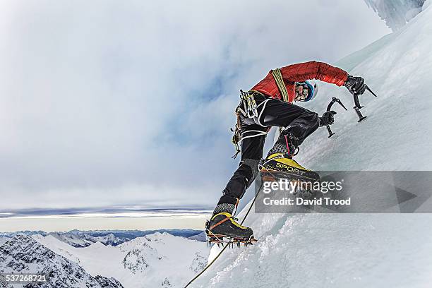 ice climbing in the austrian alps - steigeisen stock-fotos und bilder