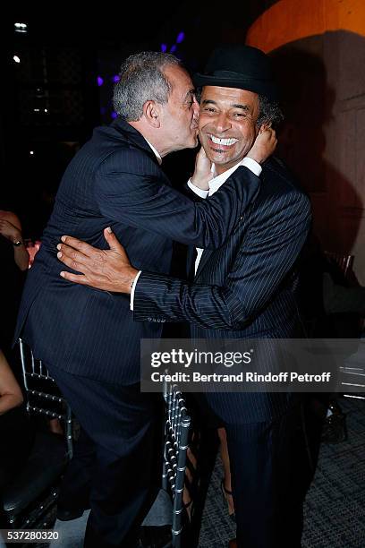 Jean Gachassin and Yannick Noah attend the Trophy of the Legends Perrier Party at Pavillon Vendome on June 1, 2016 in Paris, France.