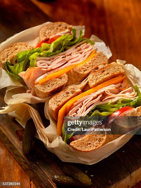 deli style turkey bagel sandwich - cheddar cheese above stock pictures, royalty-free photos & images